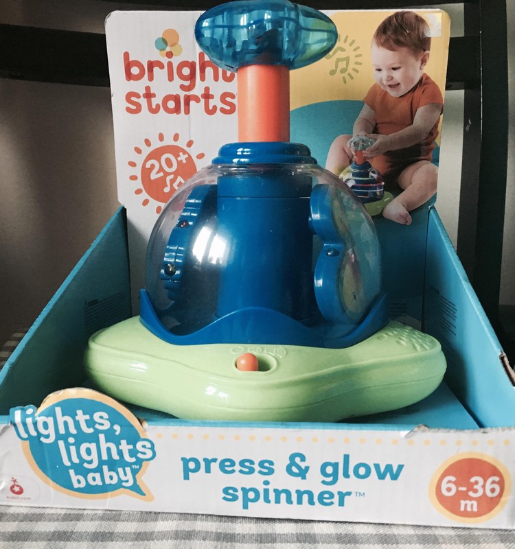 Bright Starts attīstošā rotaļlieta "vilciņš" - novērš uzmanību no nedarbu darīšanas.